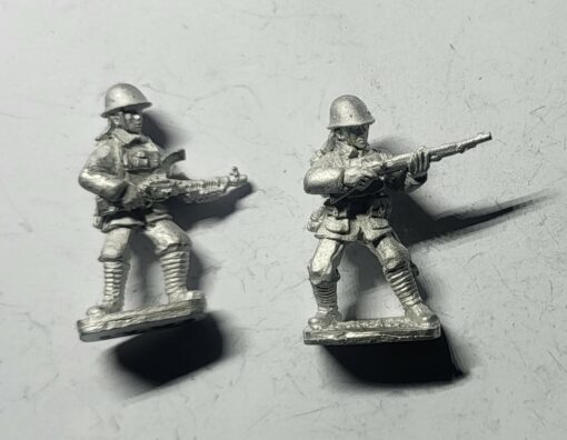 KNIL-INF-29 KNIL Madsen team hip firing Native